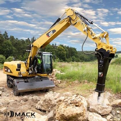 Аренда экскаватора Caterpillar с гидромолотом